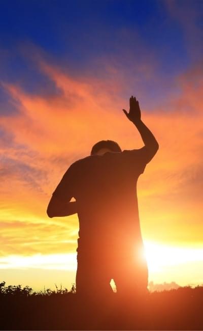 group raising their arms in victory